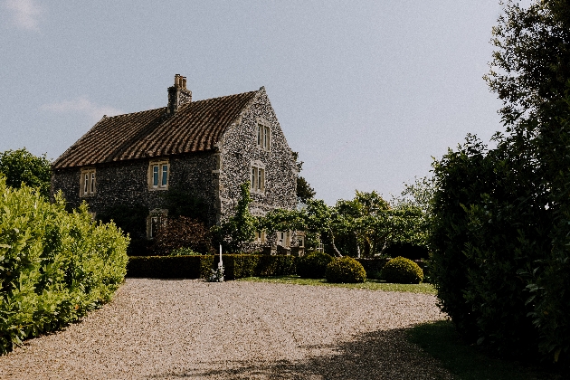 The exterior of a dark brick house