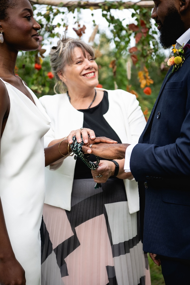 A man and women getting married by a celebrant