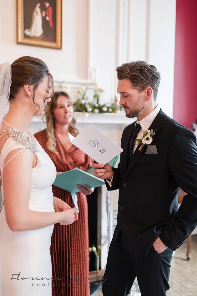 models saying vows as bride and groom